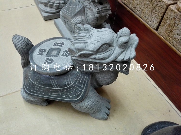 背着铜钱的龙龟石雕,青石龙龟