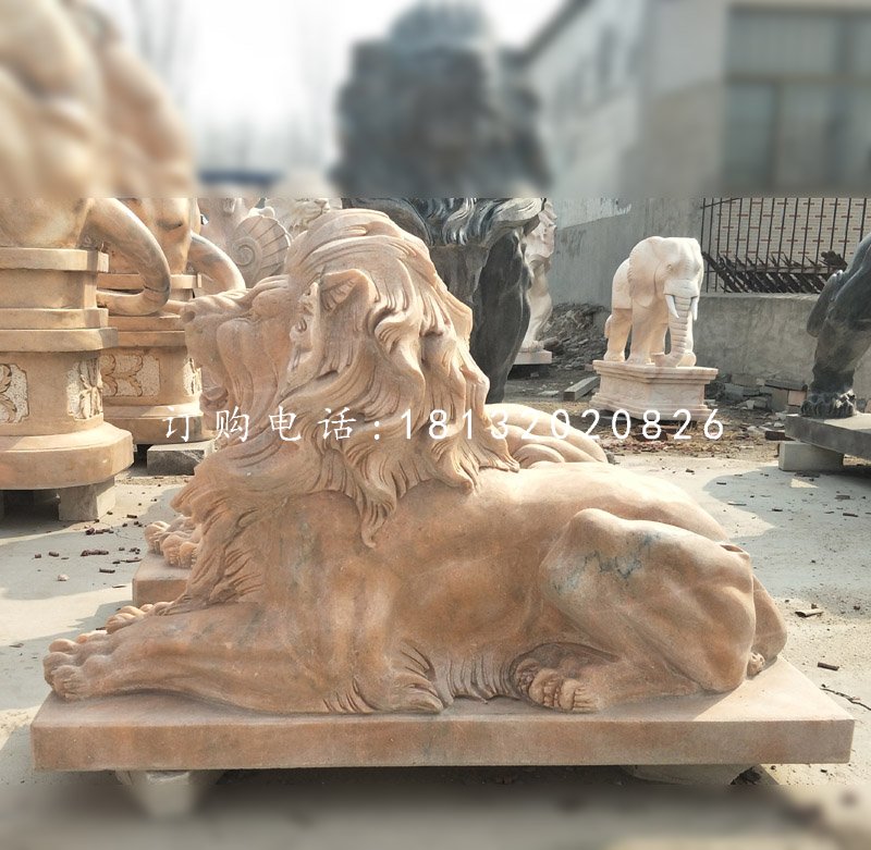趴着的西洋狮子石雕，晚霞红狮子.jpg