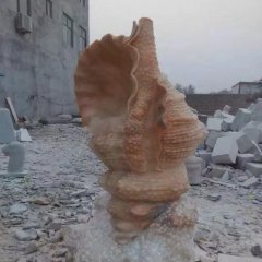 晚霞红海螺石雕