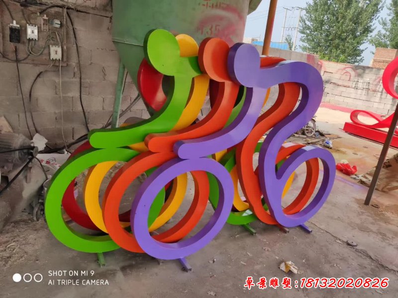 不锈钢抽象骑单车人物雕塑